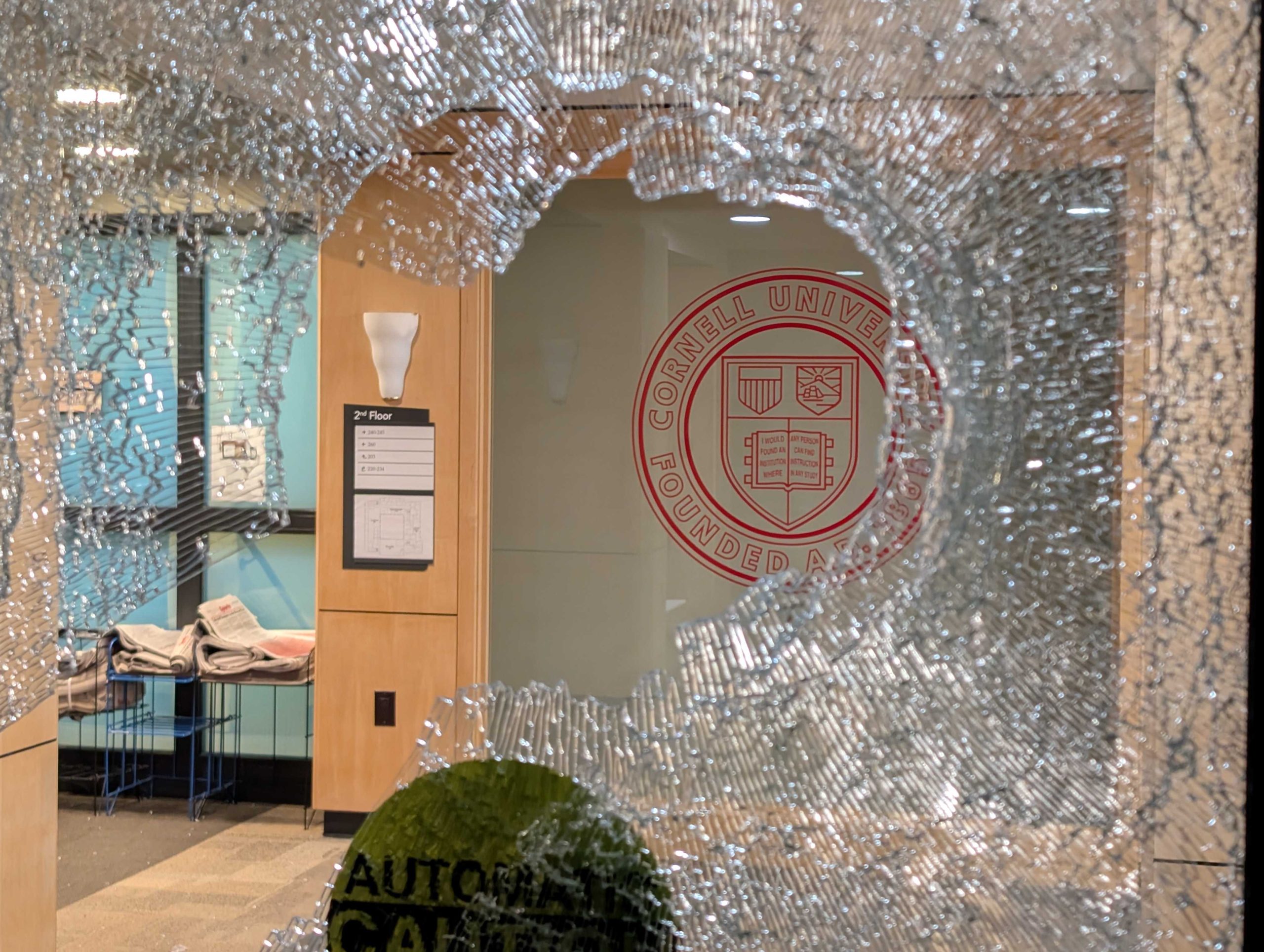 Protestors break window, paint slogans on Cornell building in wake of ...